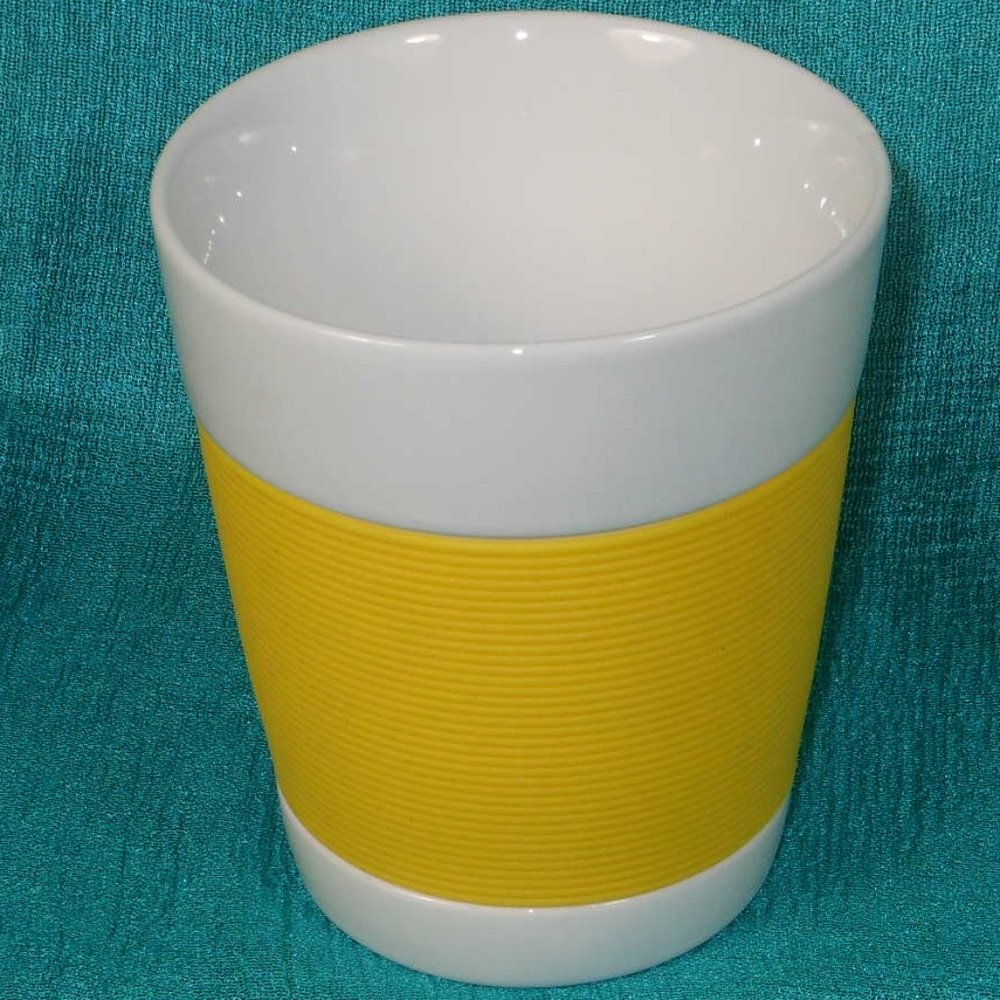 Bodum Pavina coffee mug.  White porcelain with Yellow Silicone Grips